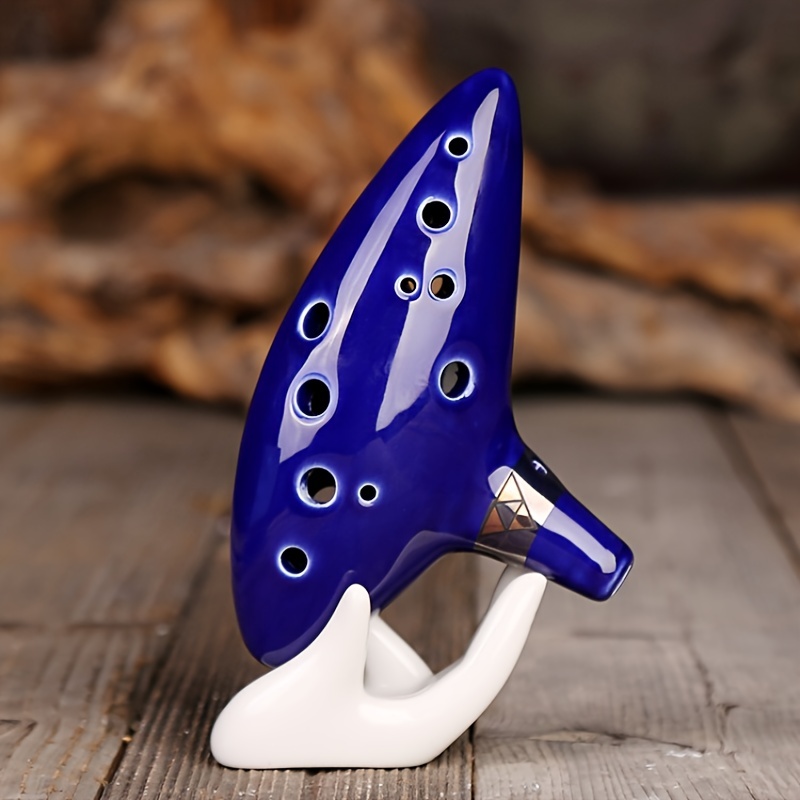  Ohuhu Zelda Ocarina with Song Book (Songs From the Legend of  Zelda), FDA Tested 12 Hole Alto C Zelda Ocarinas Play by Link Triforce,  Gift for Zelda Fans with Display Stand