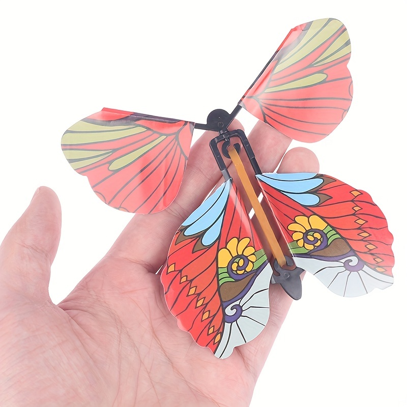 1 PCS Magic Wind Up Flying Butterfly Surprise Box, Explosion box in the  Book Rubber Band Powered Magic Fairy Flying Toy, Birthday Greeting Card  Surprise Gift 