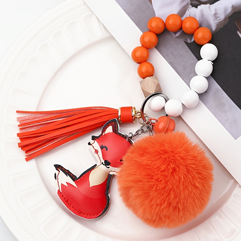 

1pc Beaded Ornament With Pu Leather Fox Bell Hairball Tassel, Orange Bag Cartoon Animal Car Keychain
