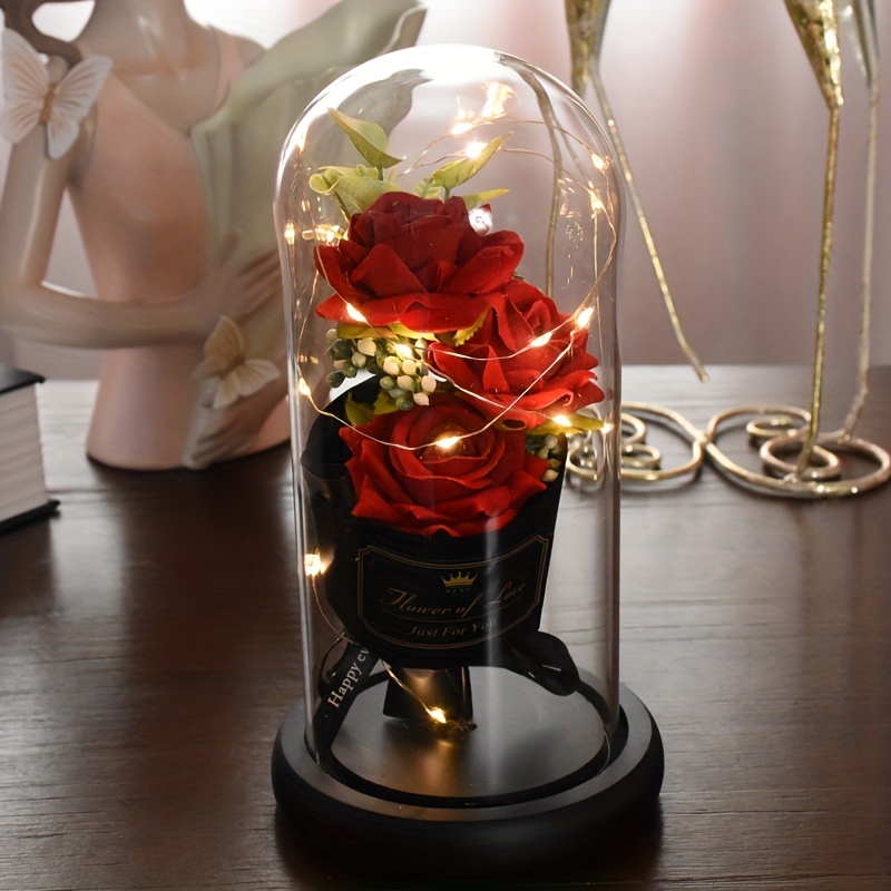 Artificial rose in on sale glass dome