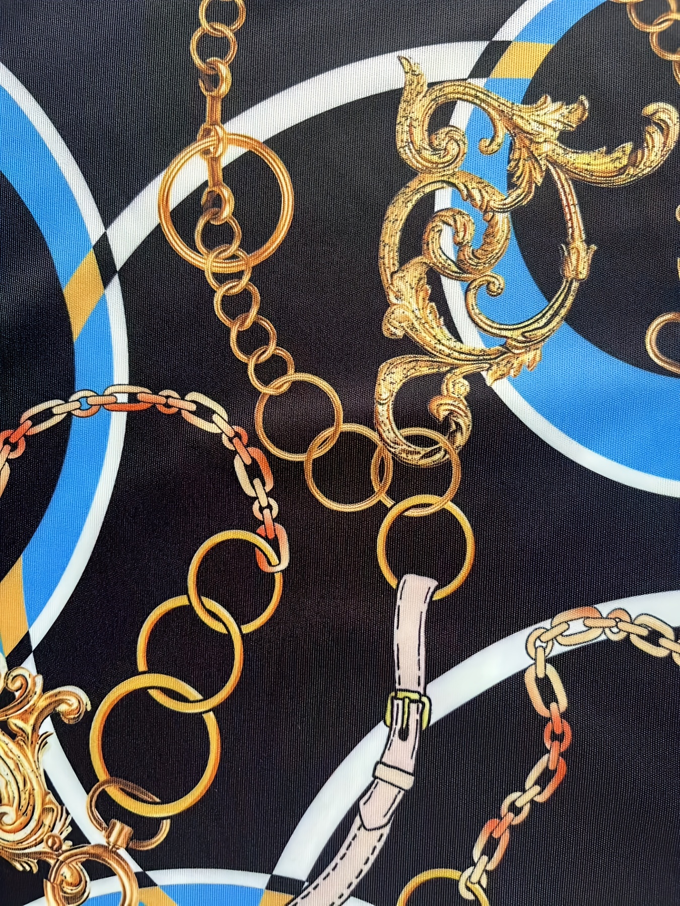Golden baroque with chains on blue background. versace style