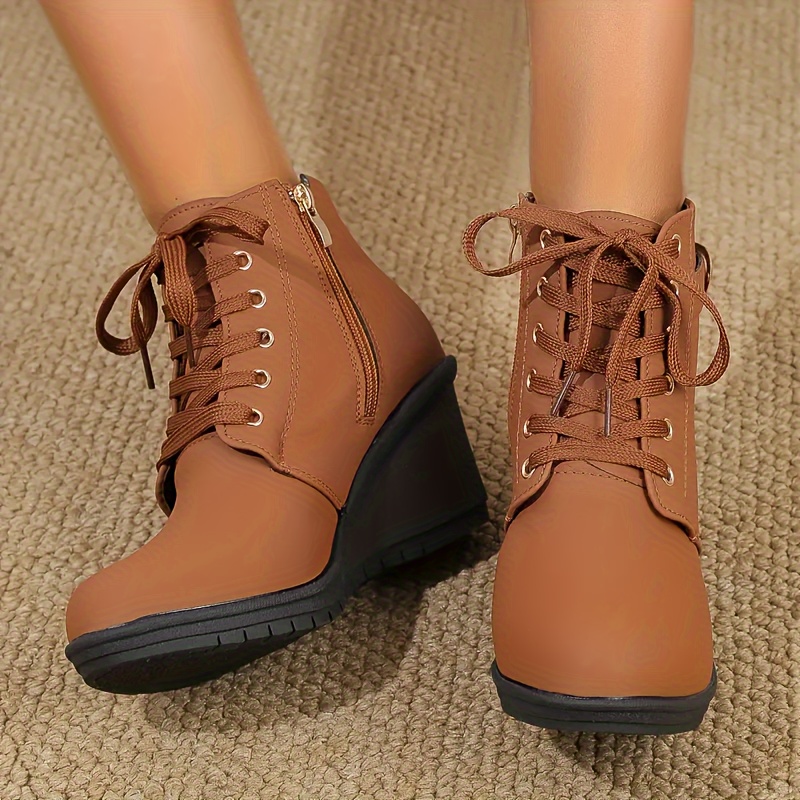 Brown wedge hotsell heel boots