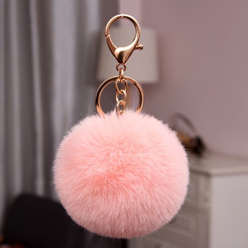 Pink fluffy ball on sale keychain