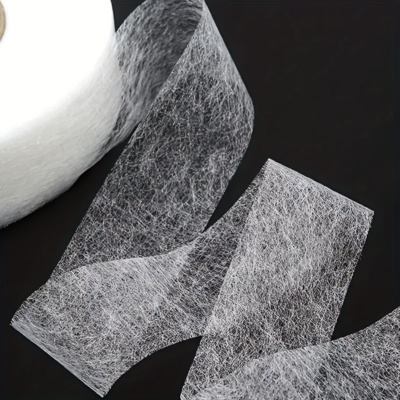 Un rouleau de ruban adhésif thermocollant pour ourlet, sans couture, ruban  adhésif en tissu pour tissu, rideau, ourlet thermocollant