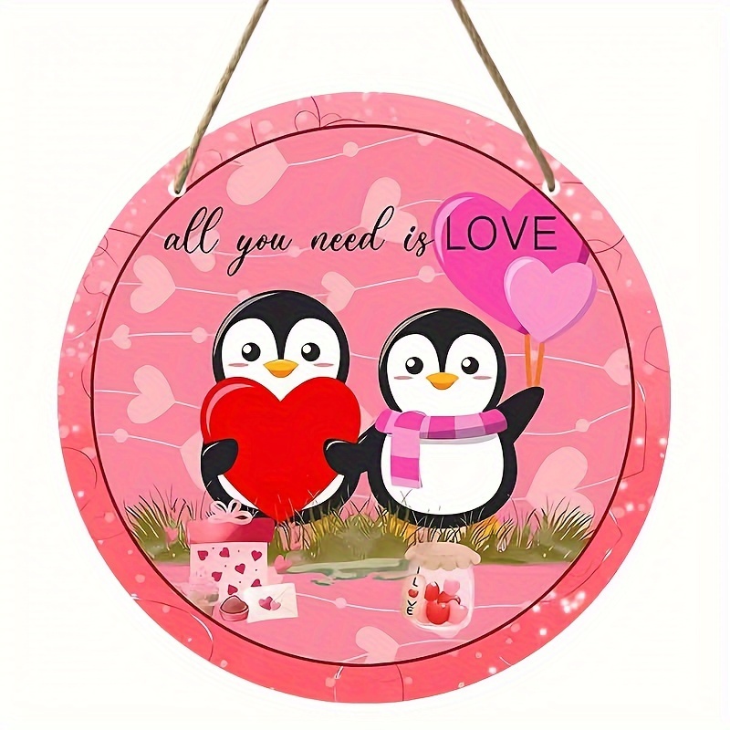Cadeau noël pour couple : décoration pingouins amoureux en bois
