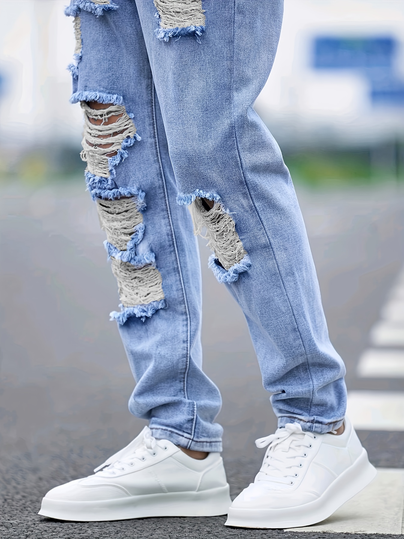 Wide leg ripped jeans for men in light blue