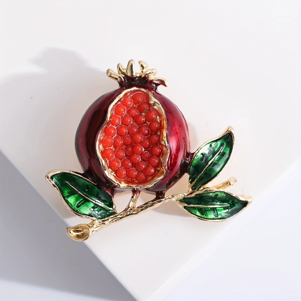 Pomegranate brooch deals