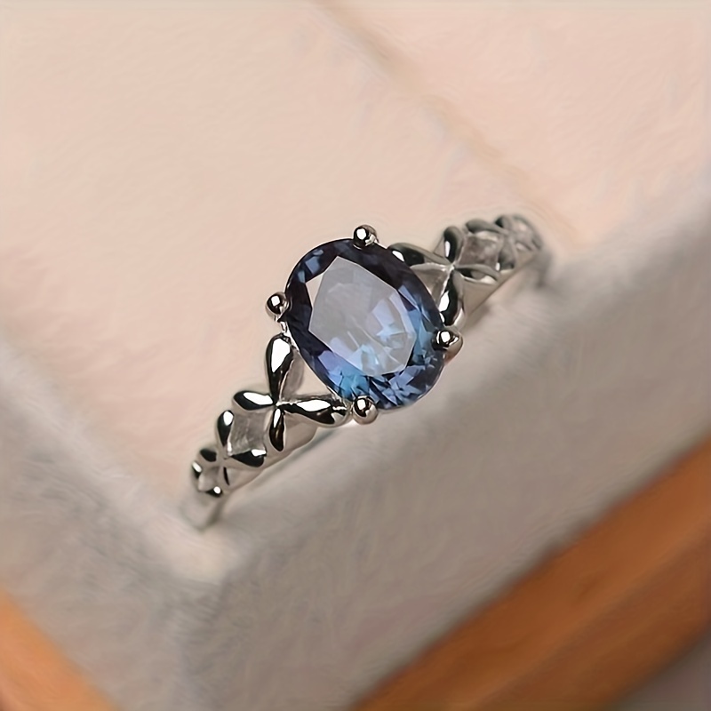 Women's Anniversary Ring with Oval Synthetic Gemstone