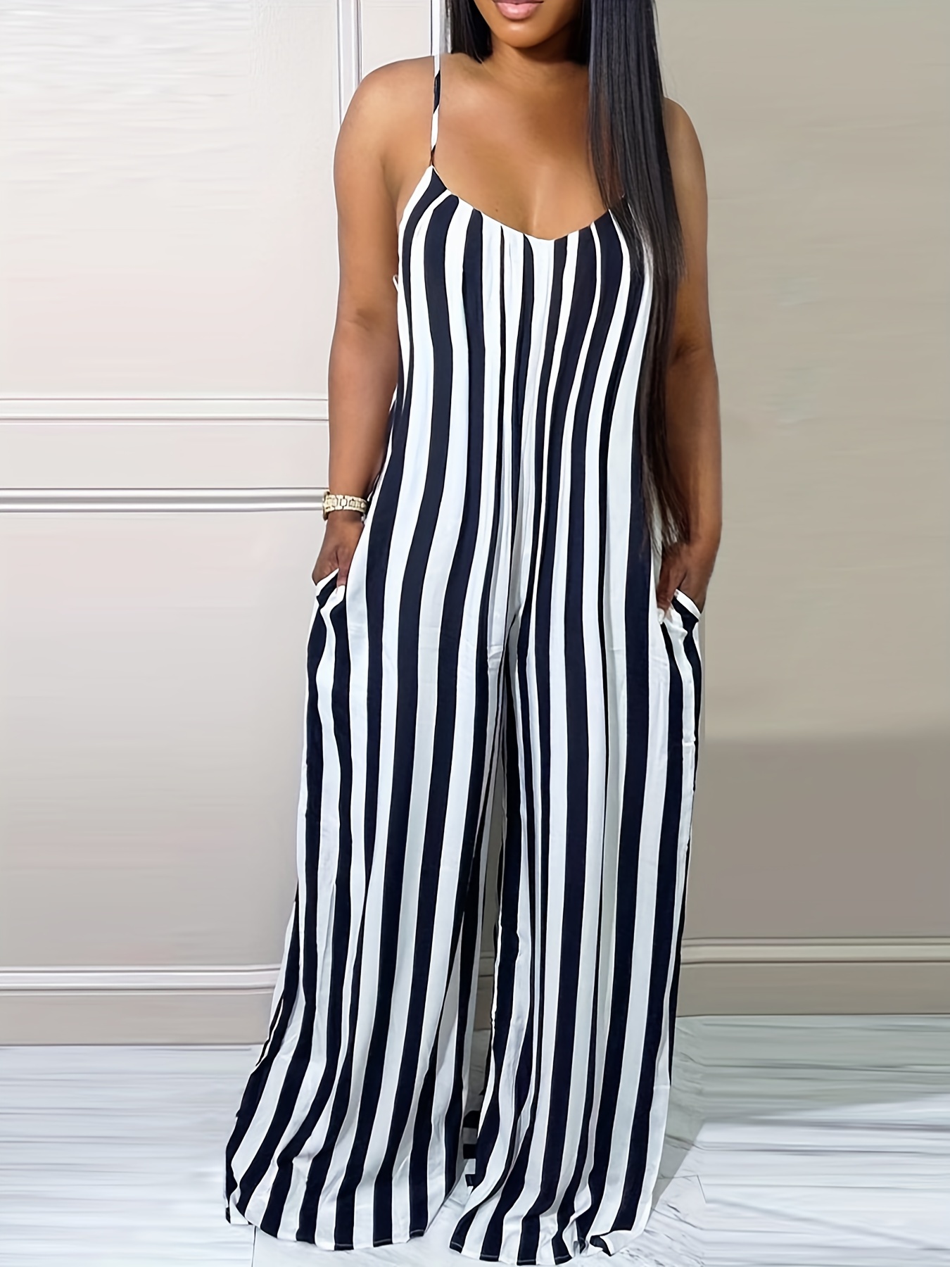 Striped spaghetti 2024 strap jumpsuit