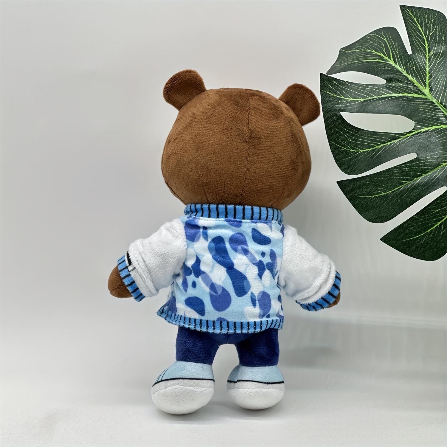 Une Petite Poupée Ours Brun Portant Un T shirt Bleu Teddy - Temu Belgium