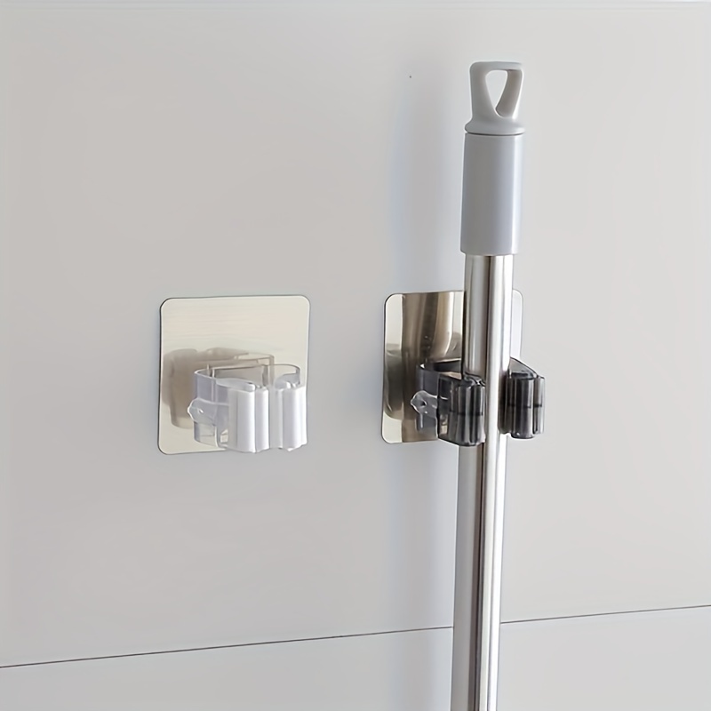 4pcs Adhesive Mop and Broom Holder, Wall Mounted, No-Drill, Multi-Functional Bathroom Storage Rack for Toilet Brush, Mop Organizer with Plastic Material