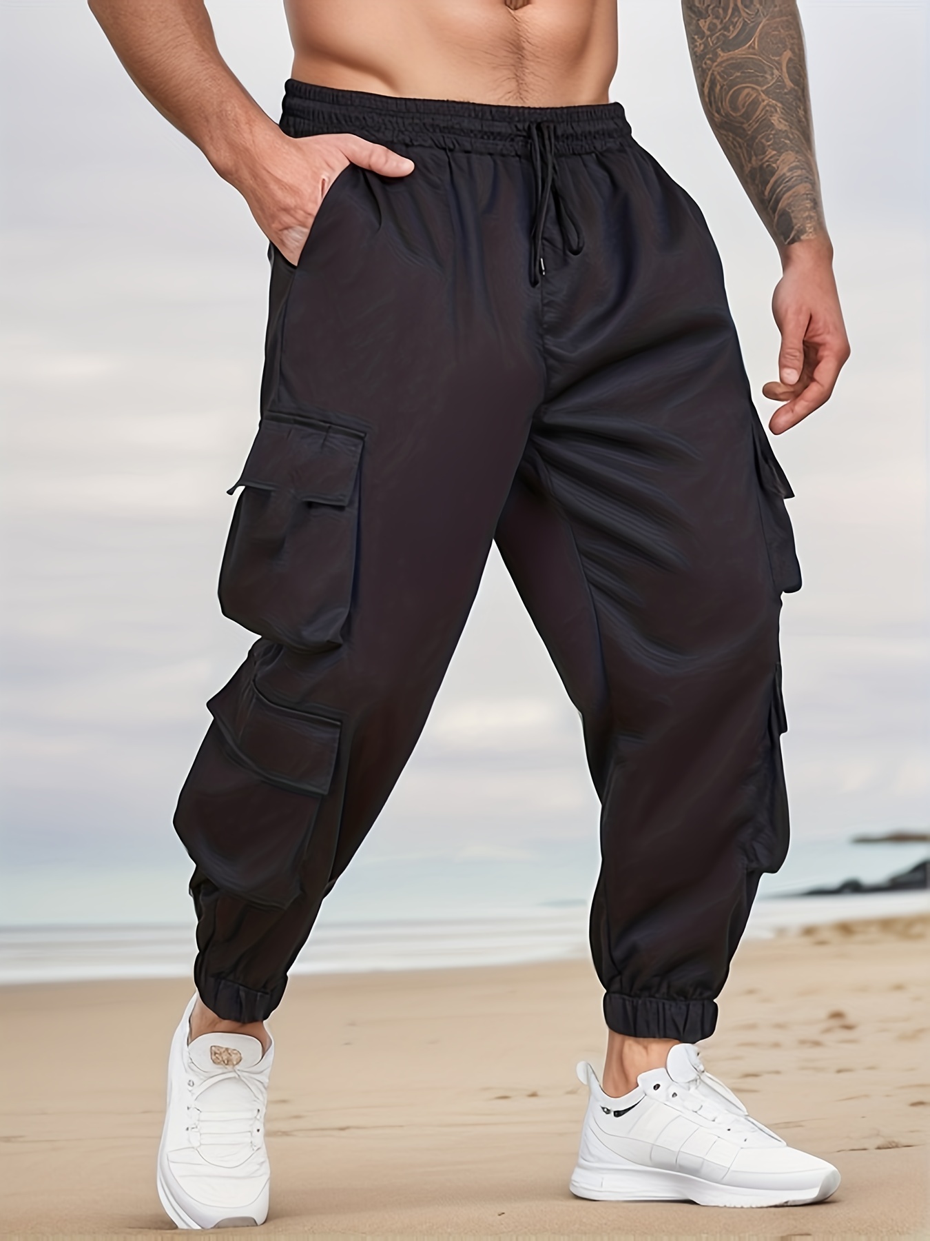 Loose cargo trousers with elastic pants legs :: LICHI - Online