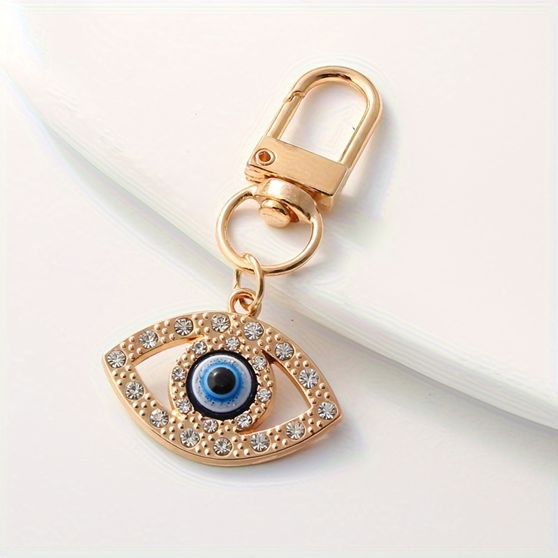 A Multi-style Hollow Blue Alloy Keychain With Rhinestones, Suitable For Airpods, Bags, And Key Additions