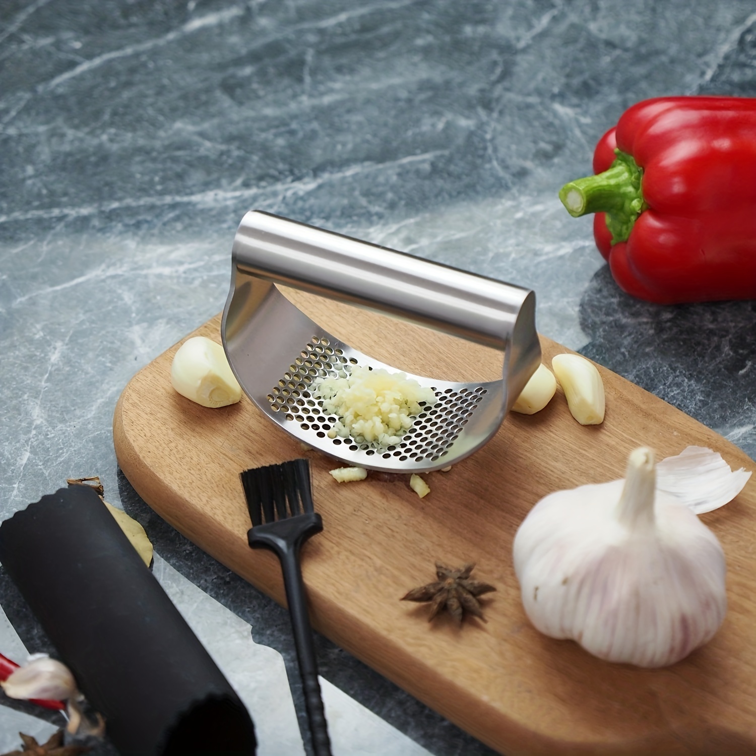 Stainless Steel Garlic Press with Arc-Shaped Design for Easy Mashing