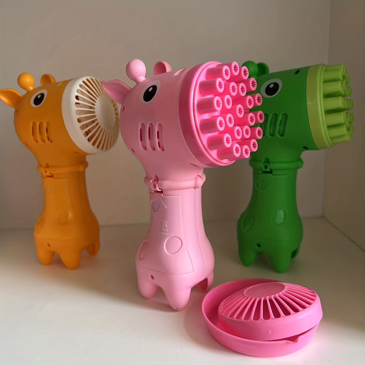 1 pieza de plástico Maquina de BURBUJAS , gracioso en forma de animal con  diseño de cámara Pistola de burbujas para Niños, Moda de Mujer