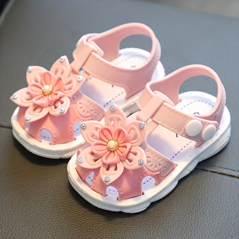 Pink sandals with on sale flowers