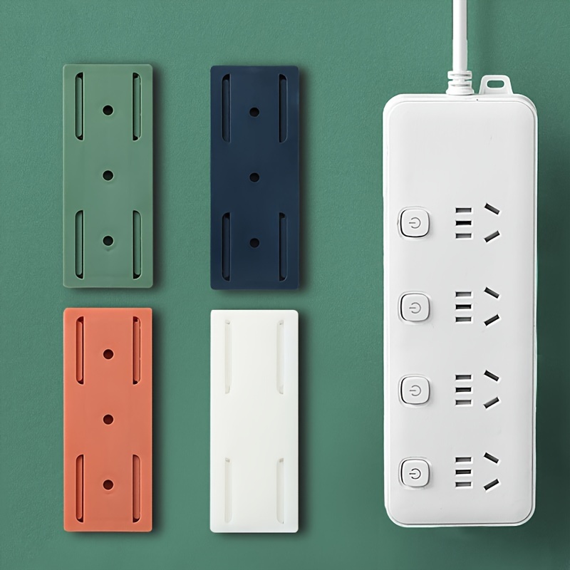 4 regletas con soporte autoadhesivo para pared para organizar enchufes y  routers inalámbricos. : : Electrónica