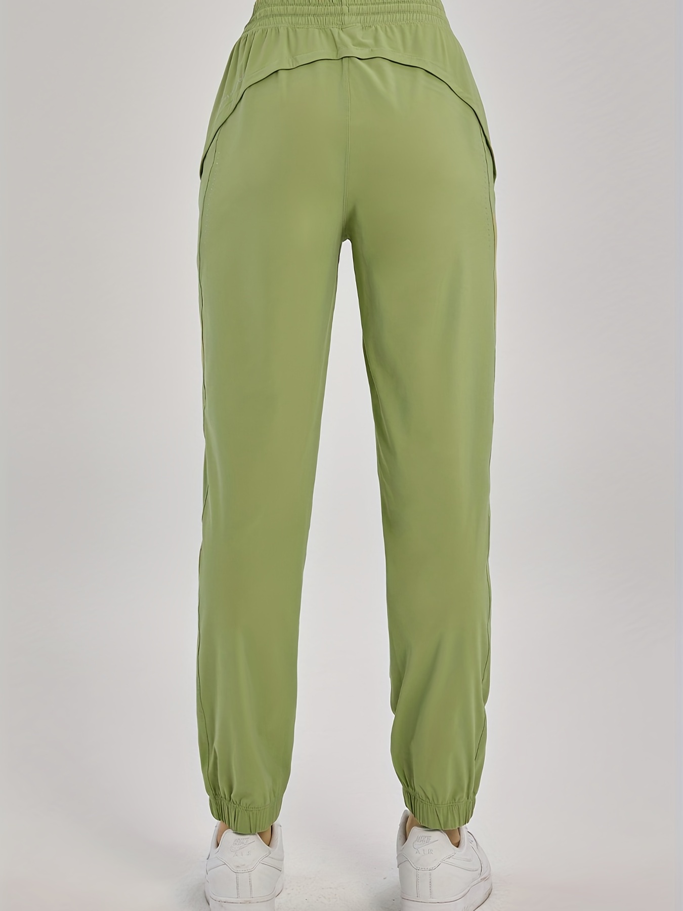 Joggers y Pants deportivos de color verde para mujer