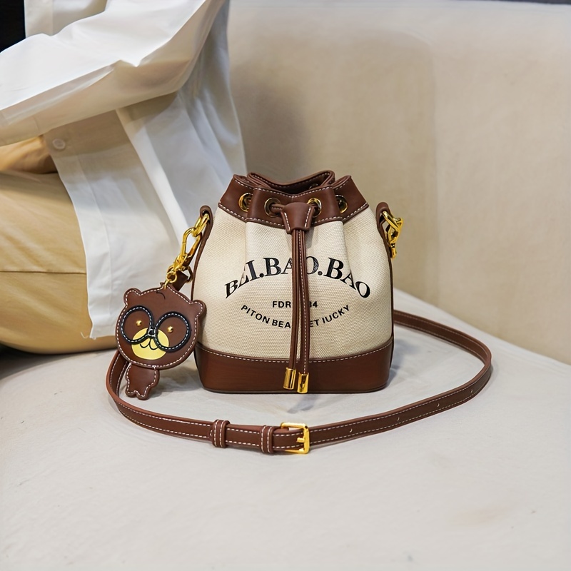 

Letter Graphic Bucket Bag For Women, Canvas Stitching Crossbody Bag, Drawstring Shoulder Purse With Pendant