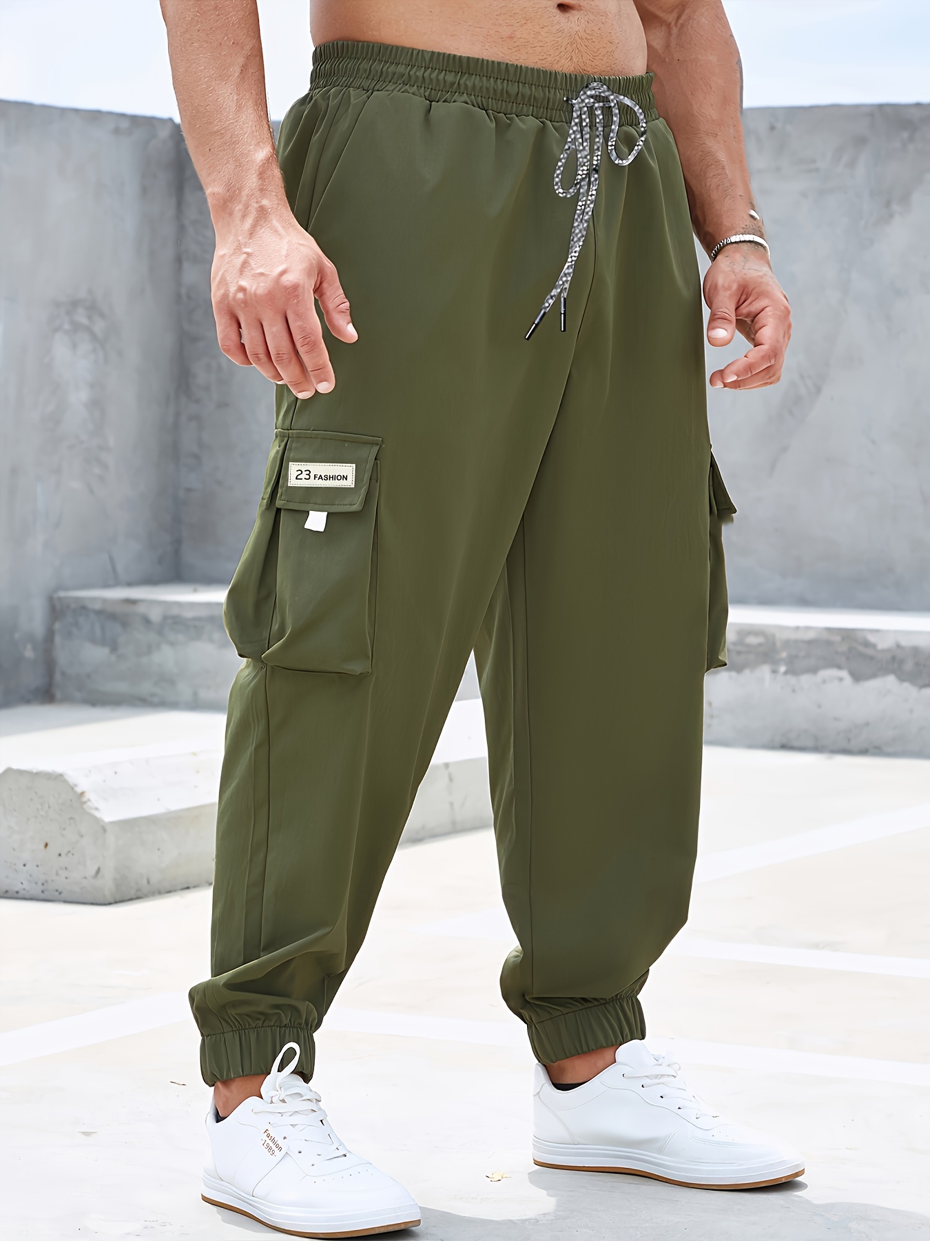 Plus Size Men's Flap Pocket Side Drawstring Waist Trousers, Solid  Fashionable Long Pants Harem Pants Design
