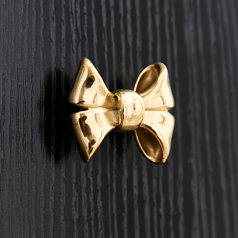 

Brass Butterfly Bow Knot Knobs, Matte Metal Finish With Polished Highlights, Decorative Knob For Cabinet, Dresser, Wardrobe, Elegant Golden Metal For Children's Room And Home Furniture, Single Pack