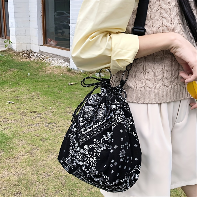 

Black Paisley Retro Pattern Crossbody Sling Bag, Drawstring Lightweight Bucket Shoulder Bag, Women's Versatile Pouch For Travel