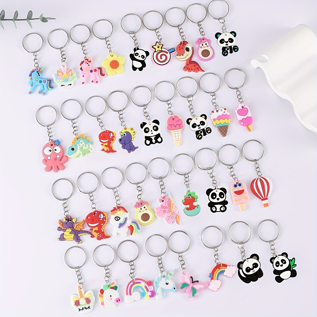 

100-piece Cartoon Keychain Set - Cute Panda, Rainbow & Avocado Designs For Bags & Keys - Fashionable Women's Accessories