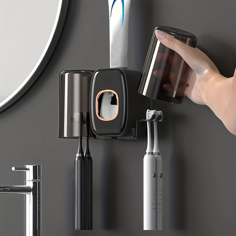 

Ensemble porte-brosse à dents et dentifrice mural 2 en 1, presse-tube automatique avec gobelet, organisateur de salle de bain pratique, plastique durable, aucune électricité nécessaire - 1 pièce