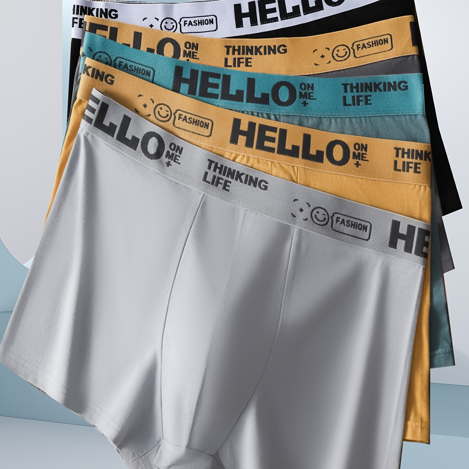 

5 boxers respirants et confortables pour hommes, en polyester extensible moyen, avec motif géométrique brodé, type culotte courte.