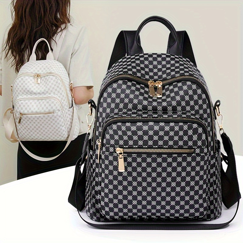 A black PU fashionable dot print combination backpack for daily