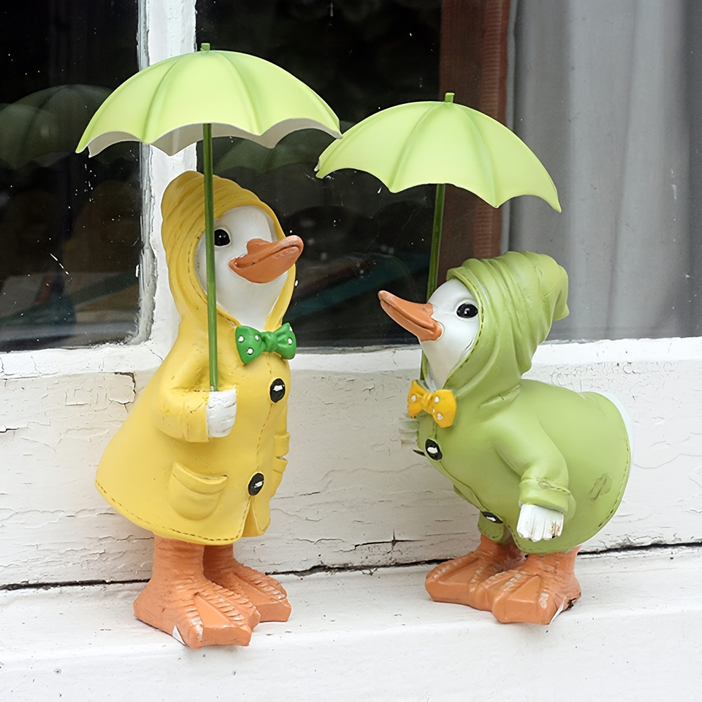 

Set Of 2 Resin Duck Figurines With Umbrellas - Indoor And Outdoor Collectible Statues For Various Room Types, Charming Tabletop Garden Decor, No Electricity Required