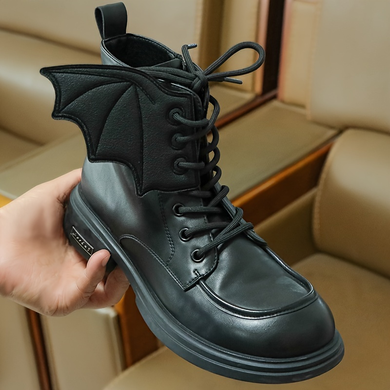 Black bat wing combat boots online