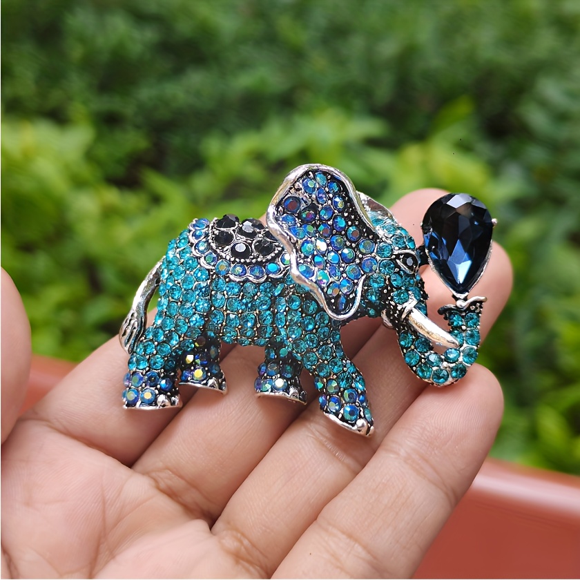 Elefante de la suerte en color Gris de Resina con detalles Dorados para  decoración 25X9,5X20 cm.-Hogarymas
