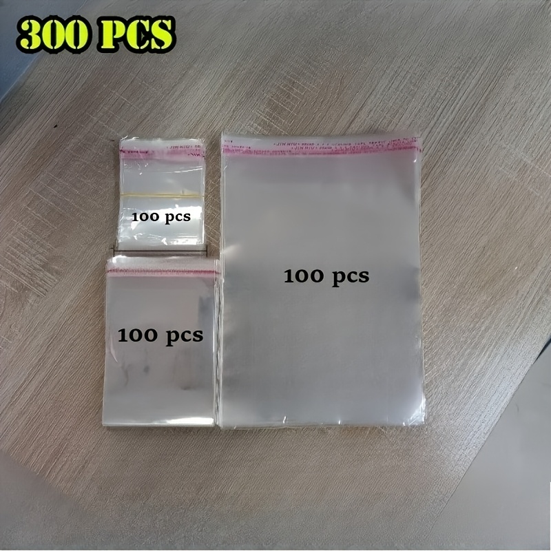 300pcs Transparent Plastic Cellophane Bags, 3 Sizes: 2.36*3.54 Inches, 3.15* Inches, 5.91*9.06 Inches, Resealable, Suitable For Packaging Photos, Jewelry, Socks, Etc.