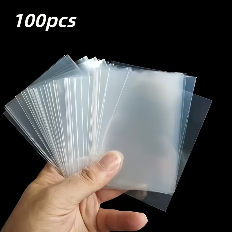 صورة العنصر 100/200/500 غلاف بطاقات  ، غلاف بطاقات تداول ناعم، غلاف بطاقات بيسبول، غلاف بلاستيكي لحماية البطاقات القياسية - مناسب لبطاقات البيسبول، بطاقات ألعاب كرة القدم، mtg