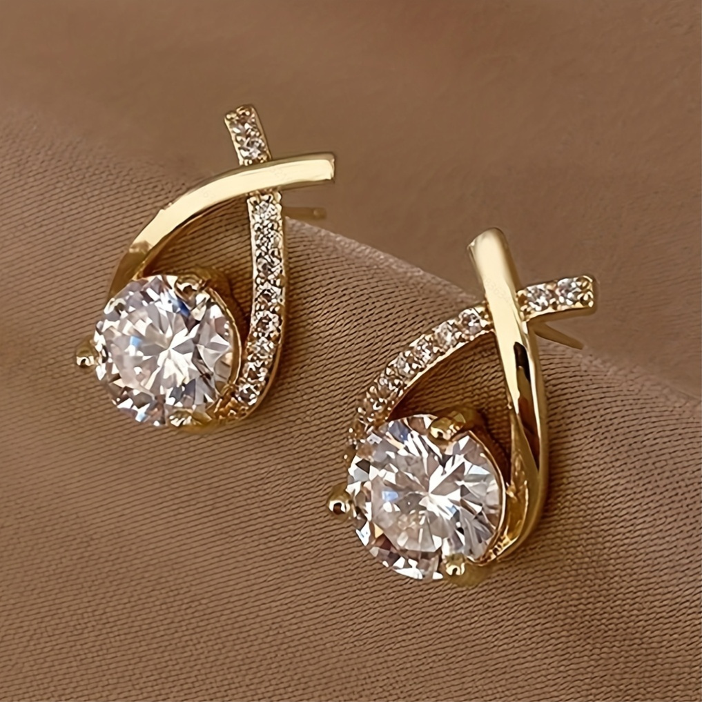 

A Pair Of Luxurious And Stylish Twist Cubic Earrings For Adornment.