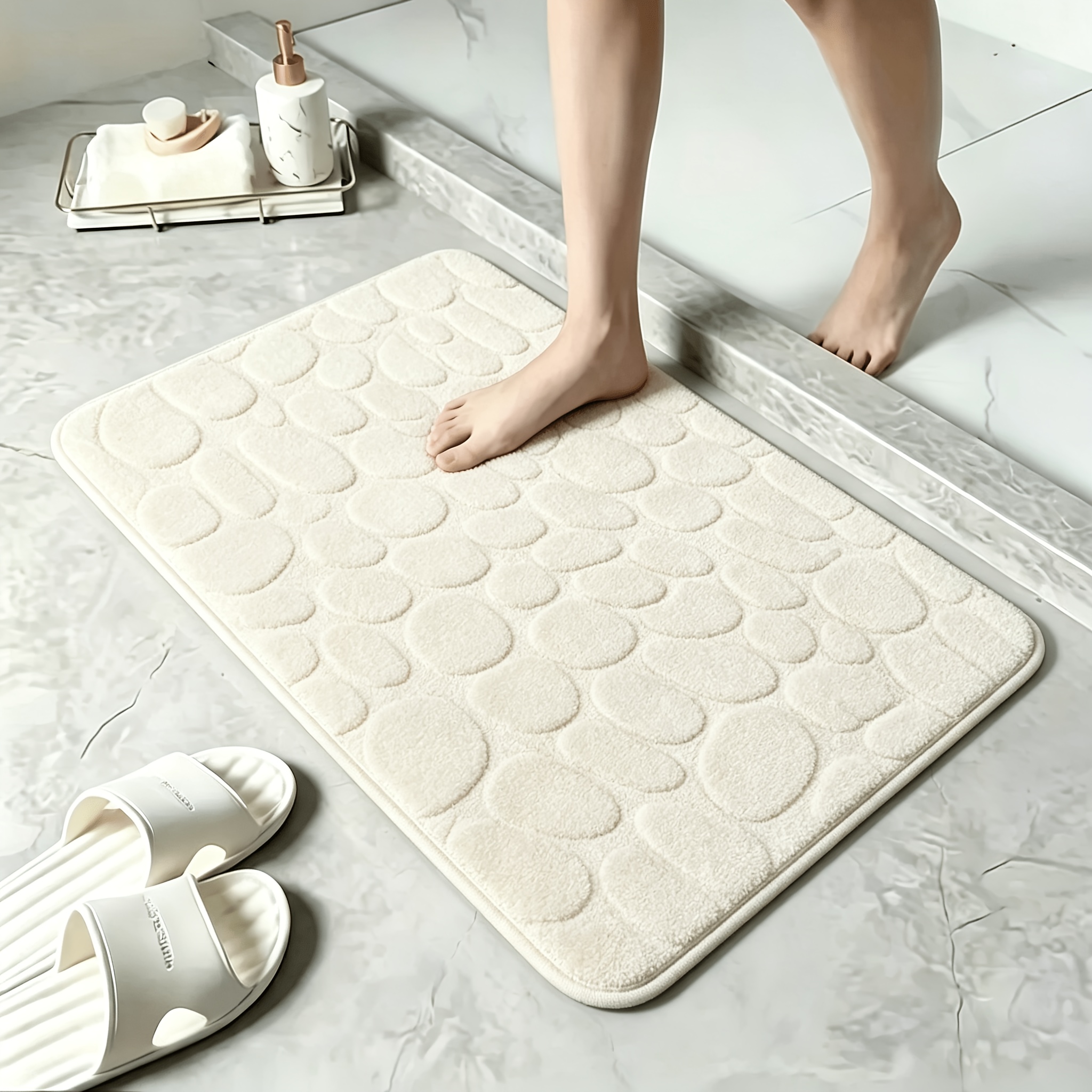 a   drying memory foam bath mat with a non slip coral design machine washable   a polyester backing lightweight and comfortable suitable for bedrooms showers and indoor use easy to clean and  