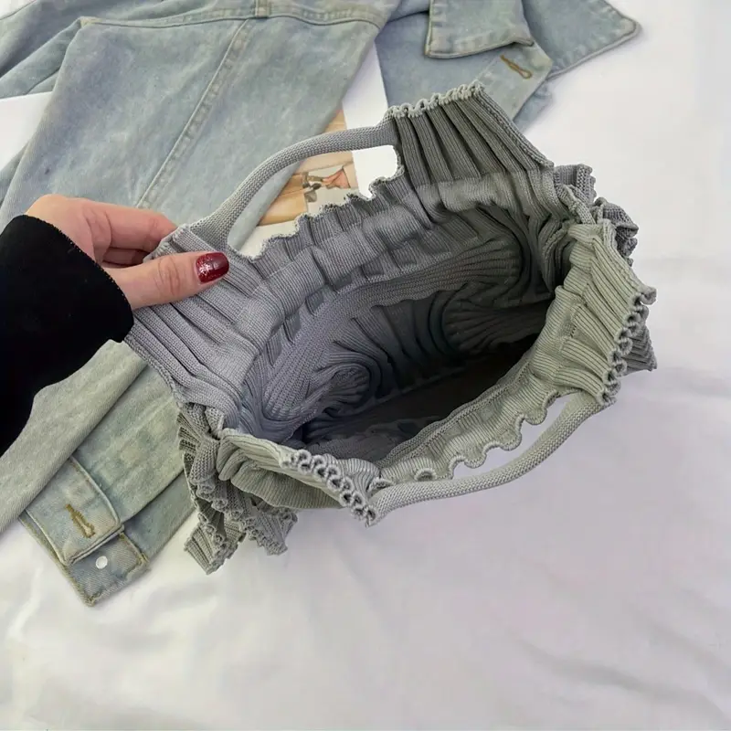 a stylish and casual multifunctional bag in a japanese and korean style this compressible knit solid color tote used as a handbag shoulder bag or backpack vacations everyday casual and details 3