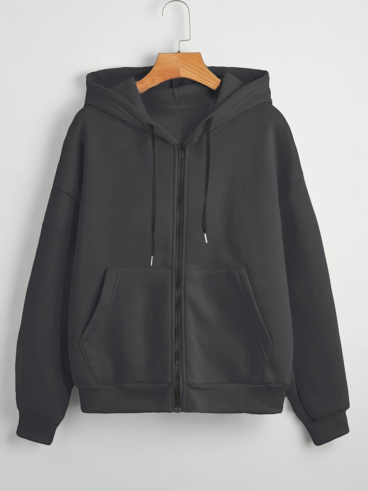 black zip hoodie sold on Temu United States