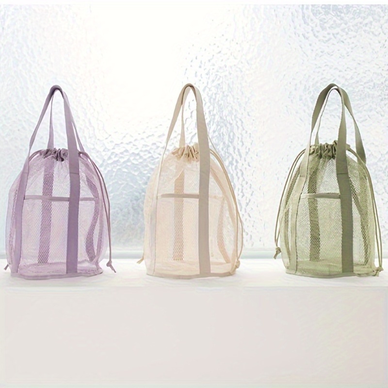 transparent mesh beach tote bag with drawstring closure durable nylon swimming bag for travel beach pool lightweight portable with multiple compartments beach bag poolside accessory stylish mesh design sturdy  