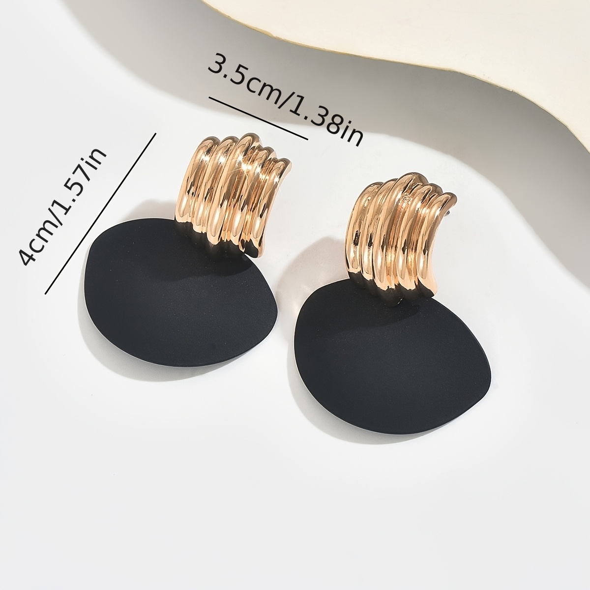 Women's Exaggerated Metal-Textured Wave-Pattern Tassel Earrings