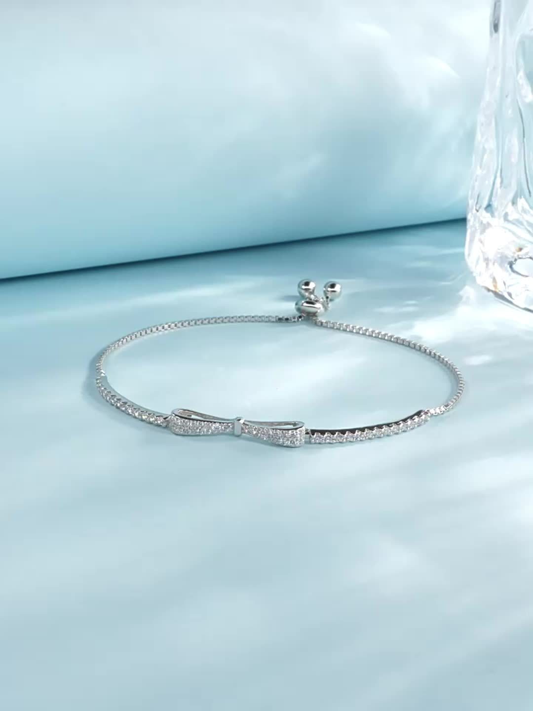 Sterling Silver Bow Bracelet CZ December Birthstone