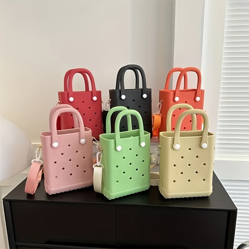 Plastic beach tote with on sale holes