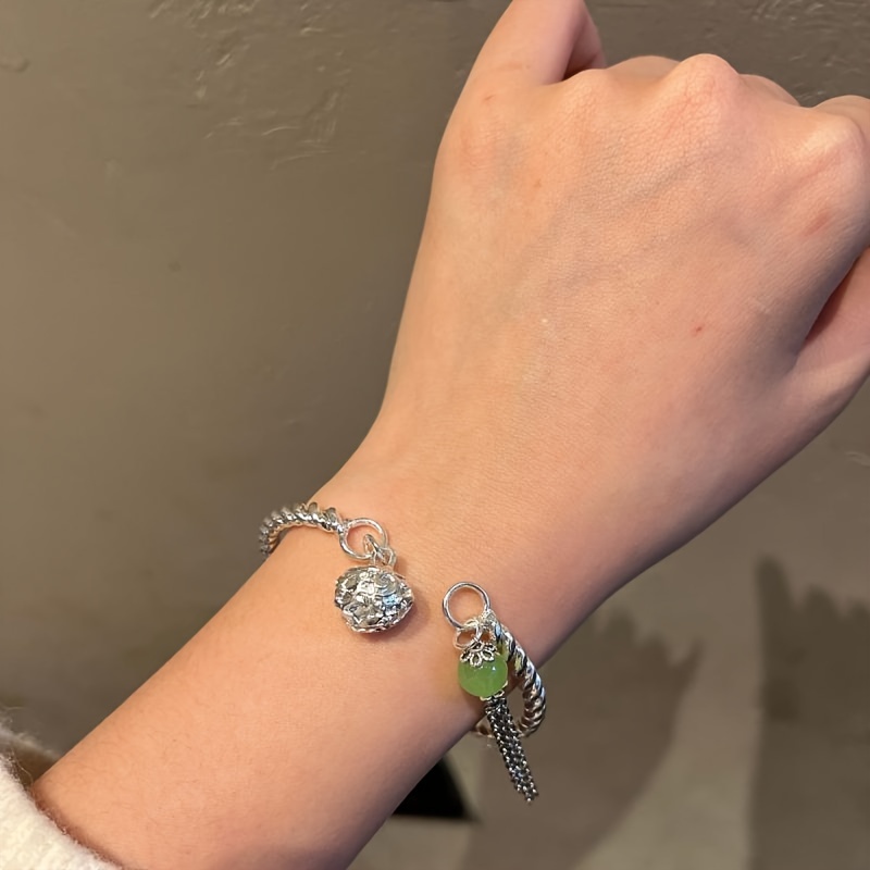 Bell on sale bracelet meaning