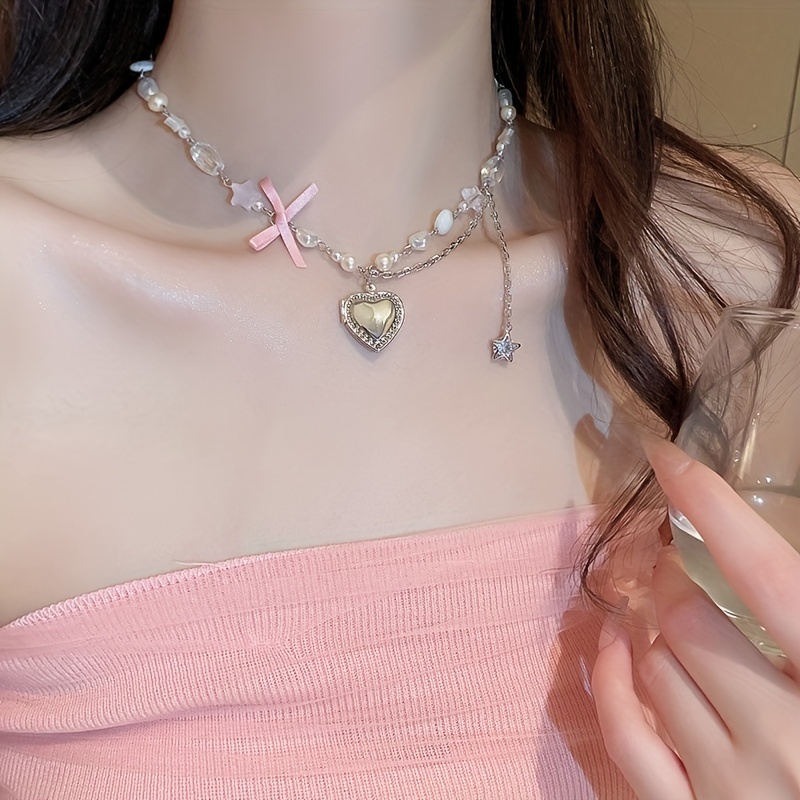 Vivienne Westwood Heart Shaped Mother Of Pearl Pendent Necklace.