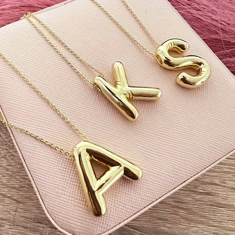 Gold alphabet locket on sale design with price