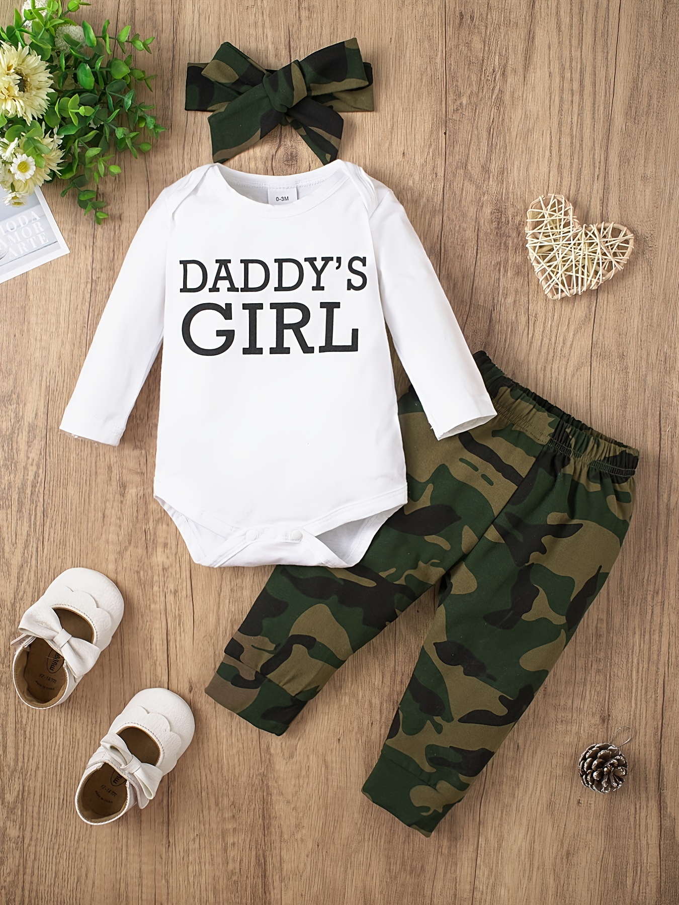 Daddy's little girl deals baby grow