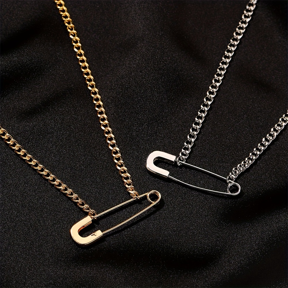 Safety pin store necklace meaning