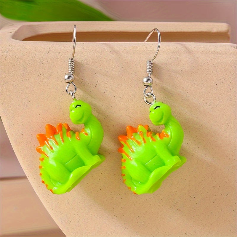 Green on sale dinosaur earrings