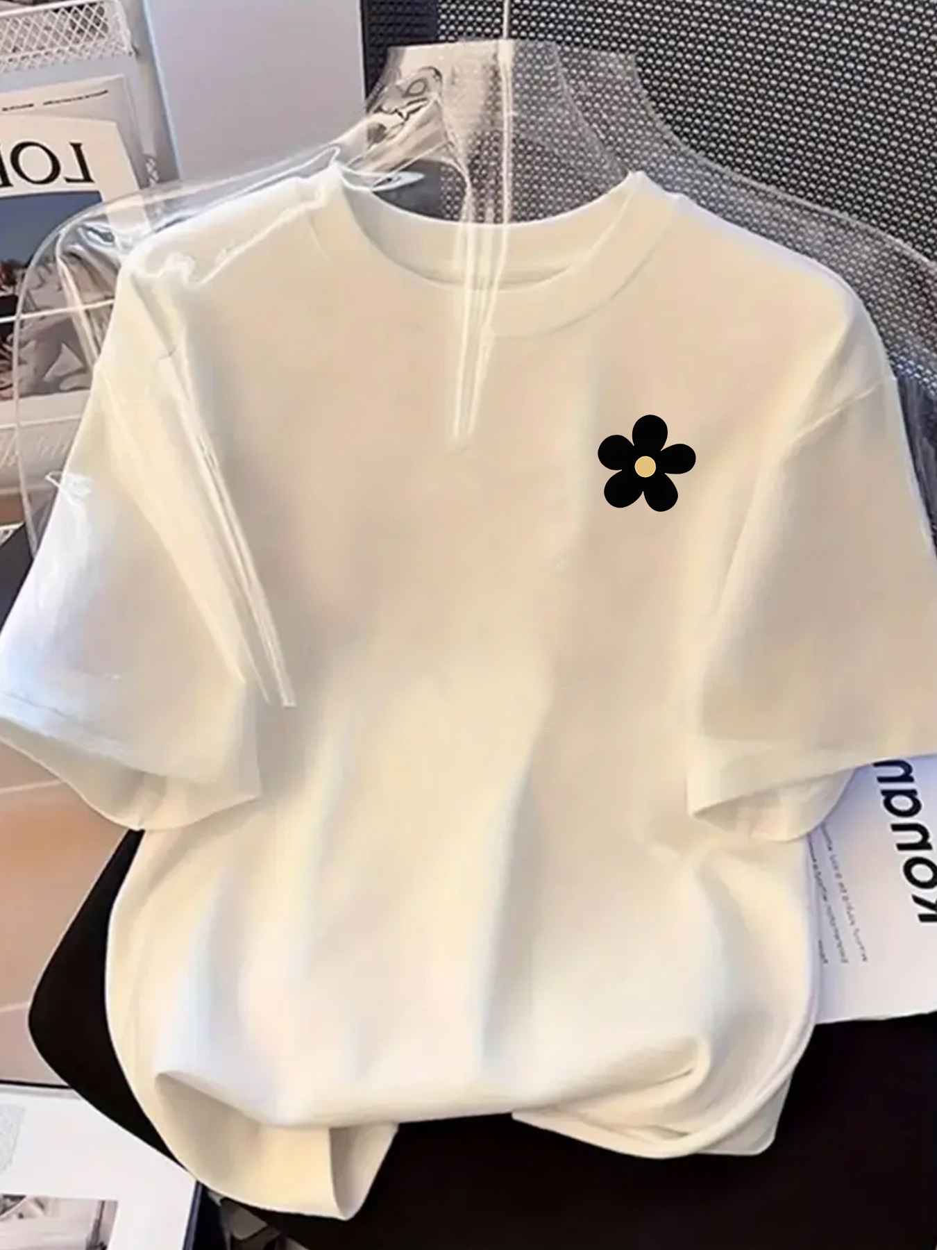 fresh and   short sleeve t shirt for women in summer featuring a loose round neck with small daisy designed to be flattering and cover   oversized fit suitable for everyday   or campus wear